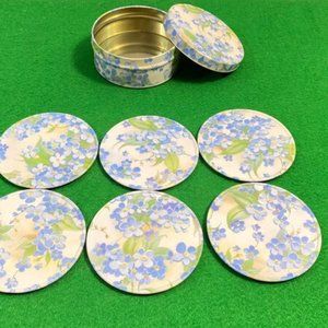 Vintage Set of 6 Drink Coasters, in addition to the box that contains them, a fl